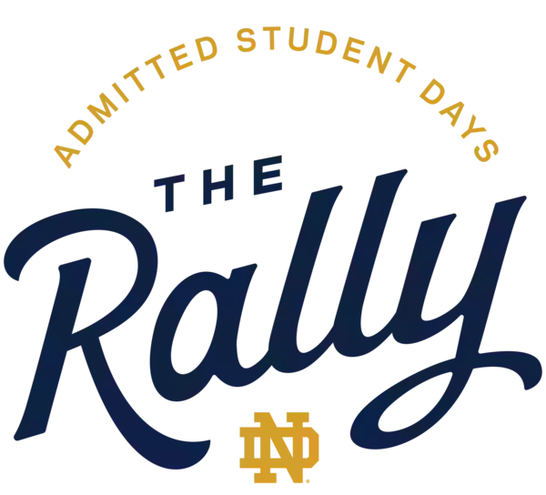 "ADMITTED STUDENT DAYS" in gold arched text, above a gold line. "THE Rally" in large navy script, with a gold Notre Dame "ND" logo below.